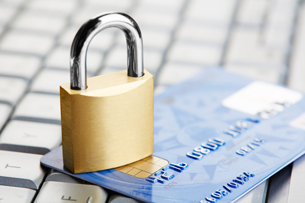 The padlock on a credit card lie on keyboard