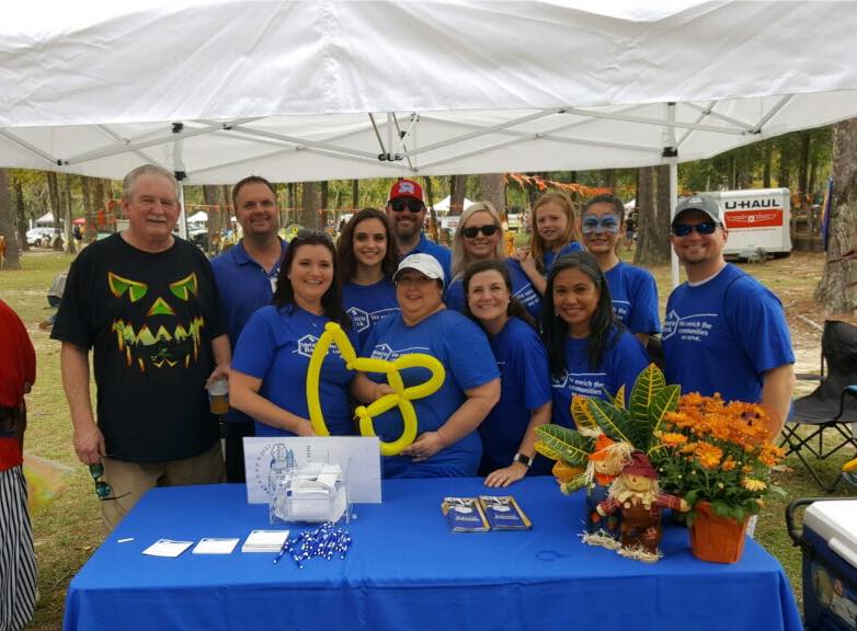 Metairie Bank employees at Monster Mash table