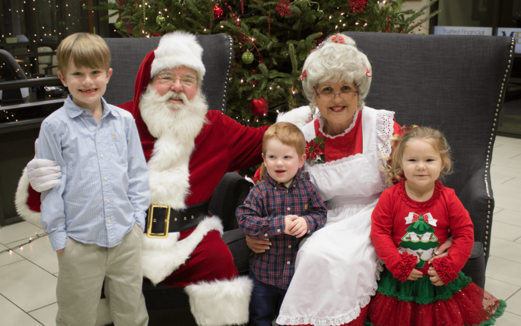 santa and mrs. claus with kids